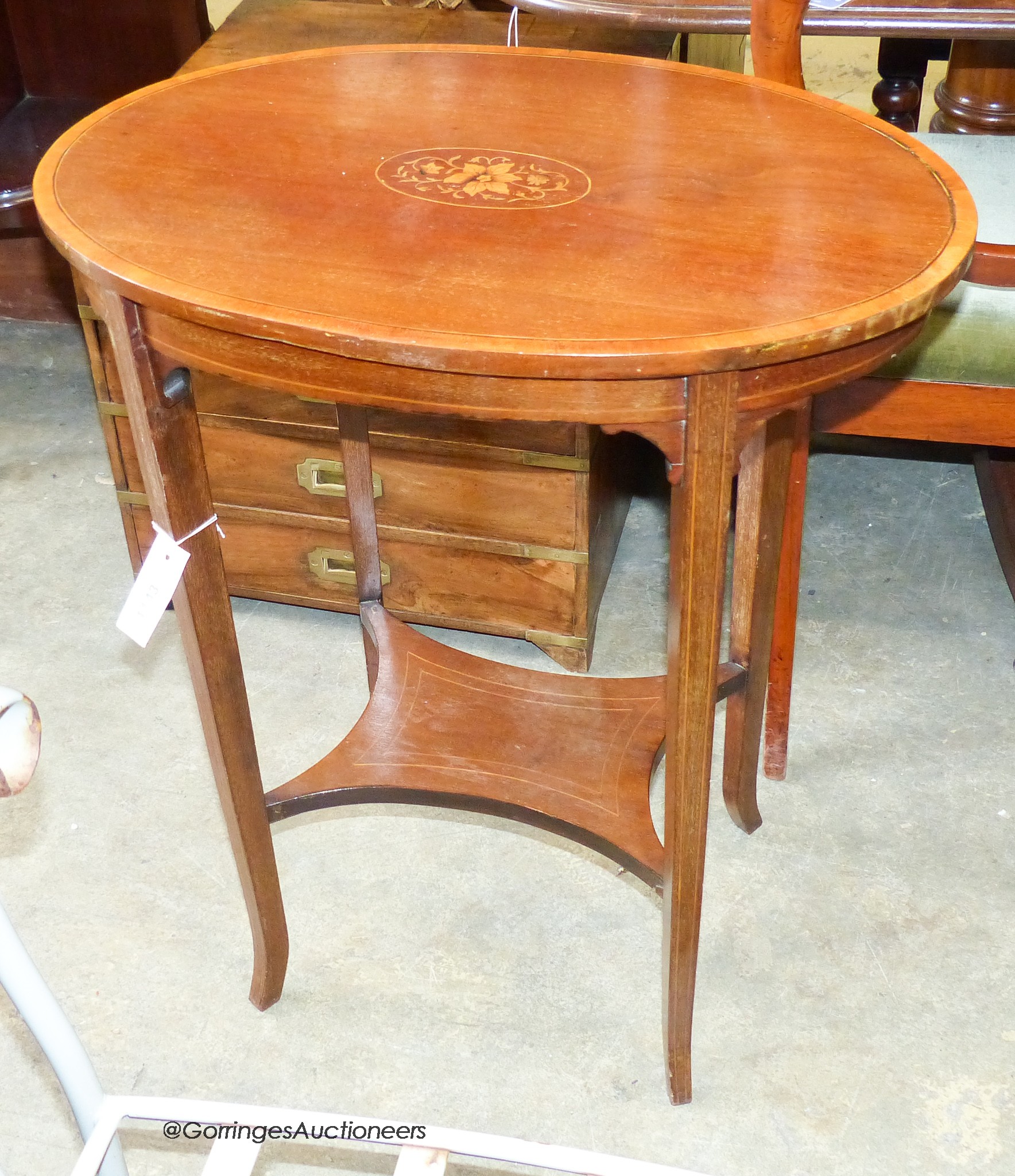 An Edwardian satinwood banded and inlaid oval occasional table. W-60, D-39, H-72cm.